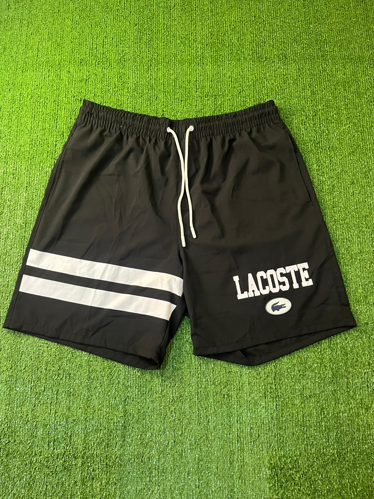 Bermuda Tactel Lacoste  na cor Cor única - Amaral Importz